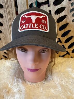 The Classic Dark Gray Trucker Hat with Red Cattle Co Patch